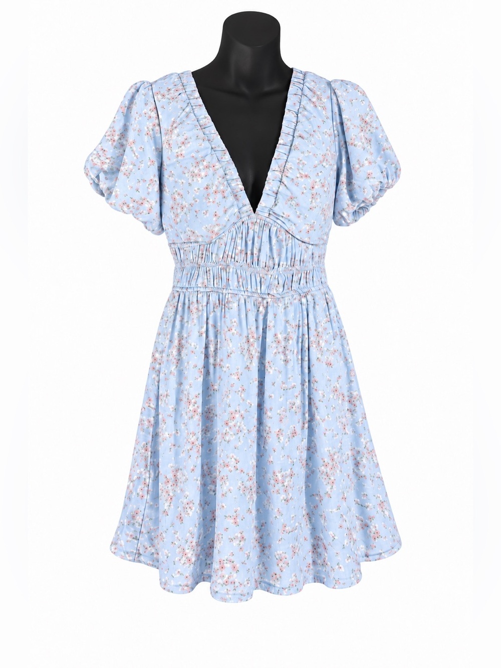 Alter’d State a light blue floral mini dress featuring a plunging V-neckline wit